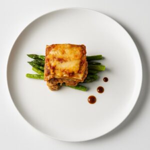 Three layer Italian sausage, ricotta cheese, lasagna with asparagus
